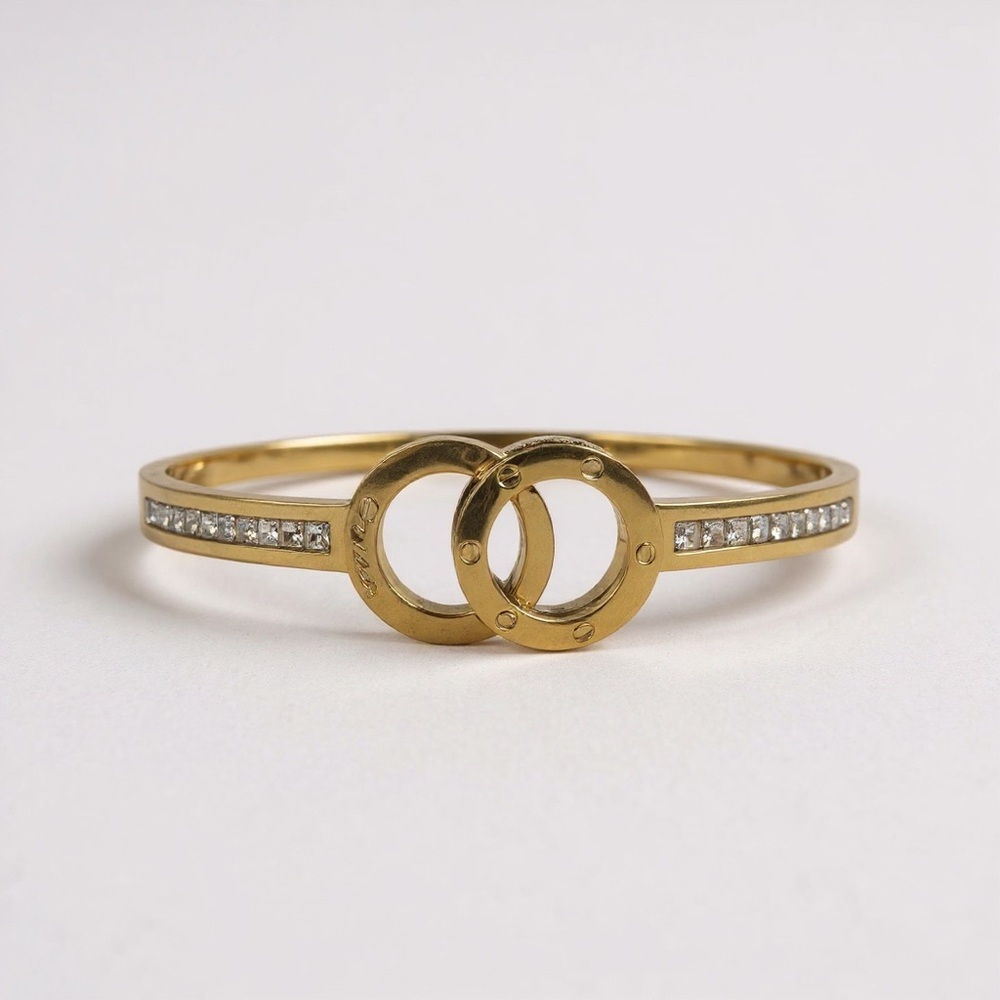 Goldstone Bangle Bracelet With Interlocking Rings… - image 1